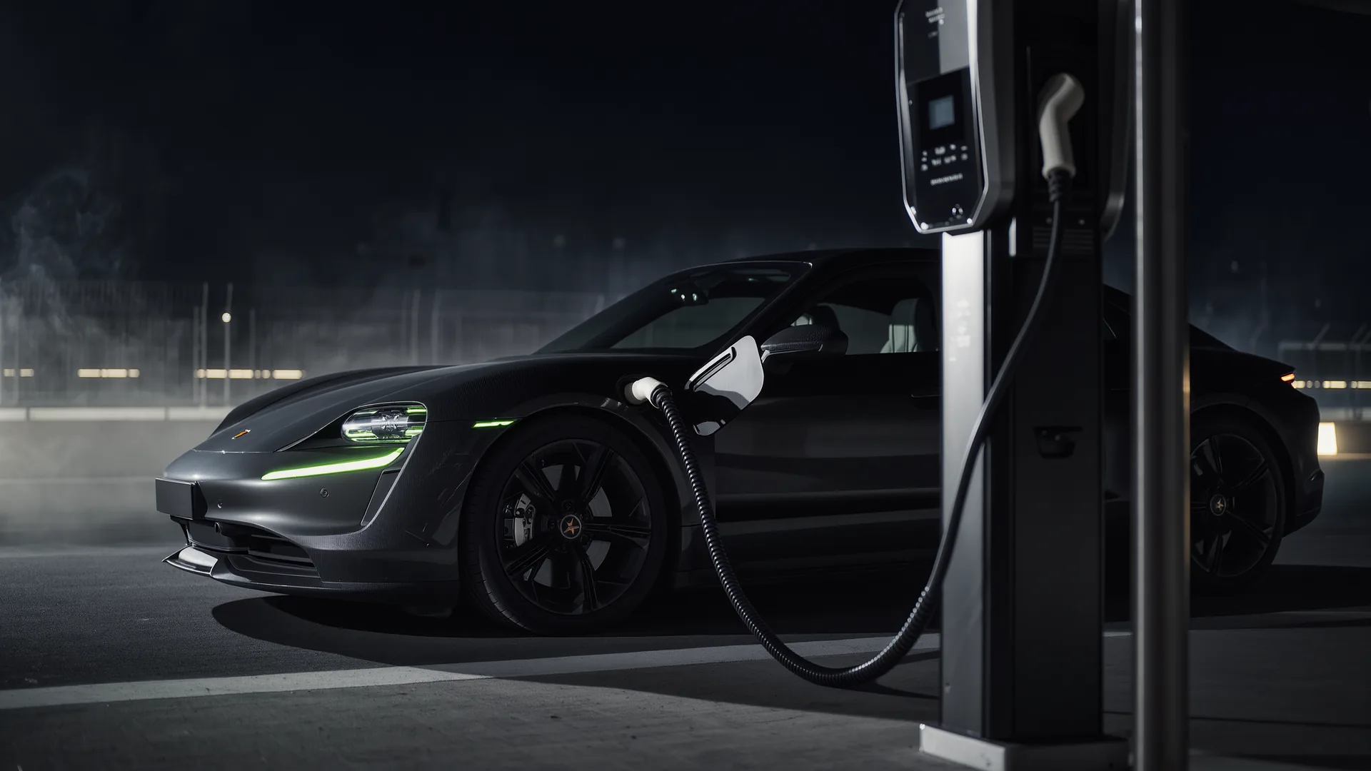 Electric car connected to a fast charger with the charging curve displayed