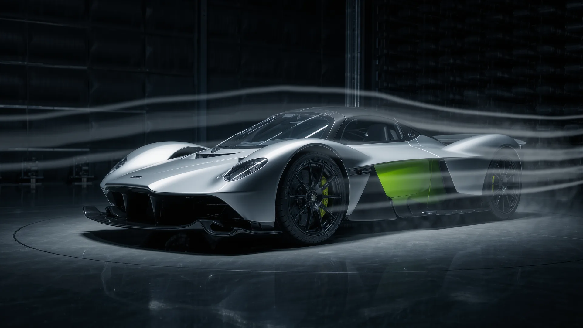 Airflow visualisation streaming over the body of a low slung performance car