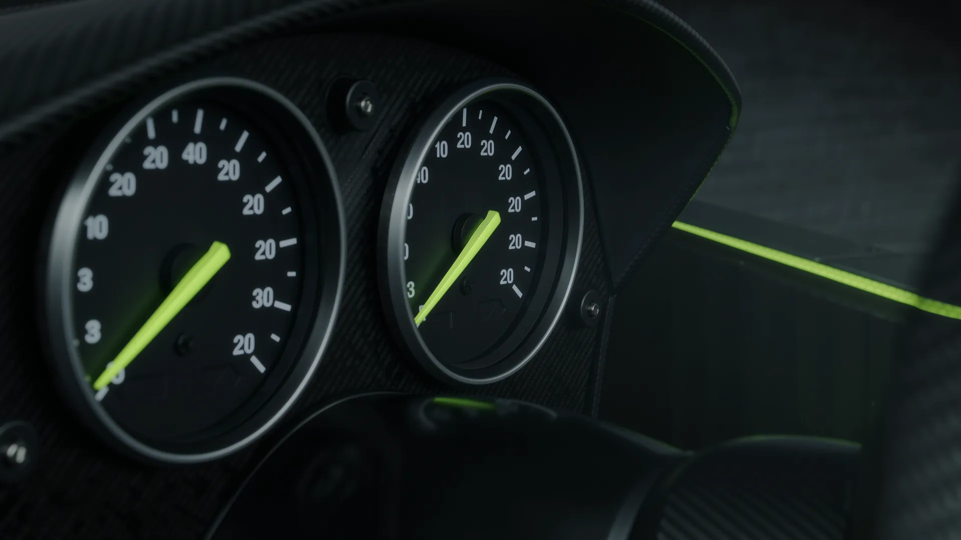 Tachometer and speedometer of a performance car at sustained maximum speed
