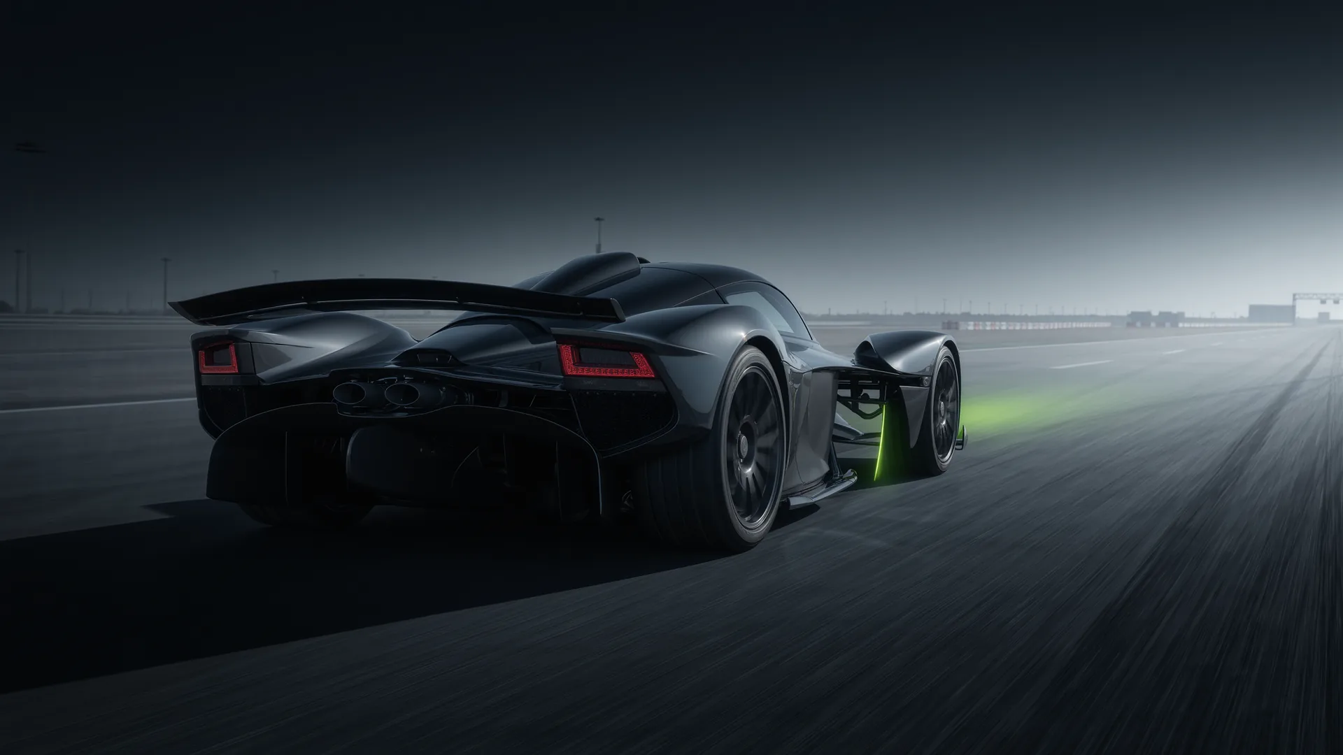 Electric performance car accelerating away from a standstill on a test track