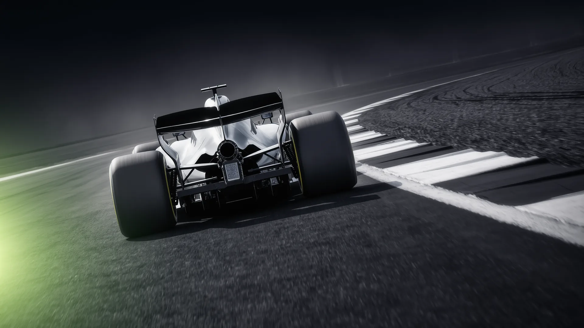 Fast sweeping corner of a racing circuit taken at high speed with visible aerodynamic load