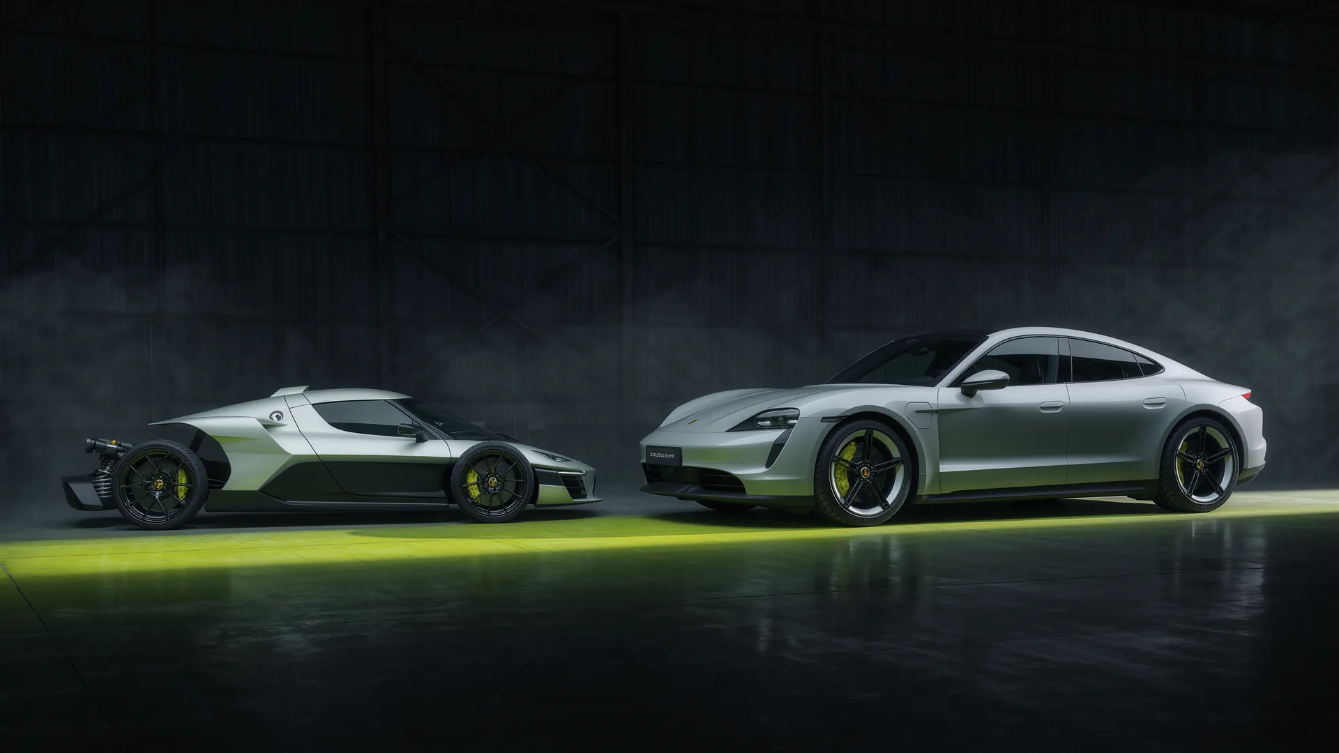 Two performance cars of very different size lined up side by side for comparison