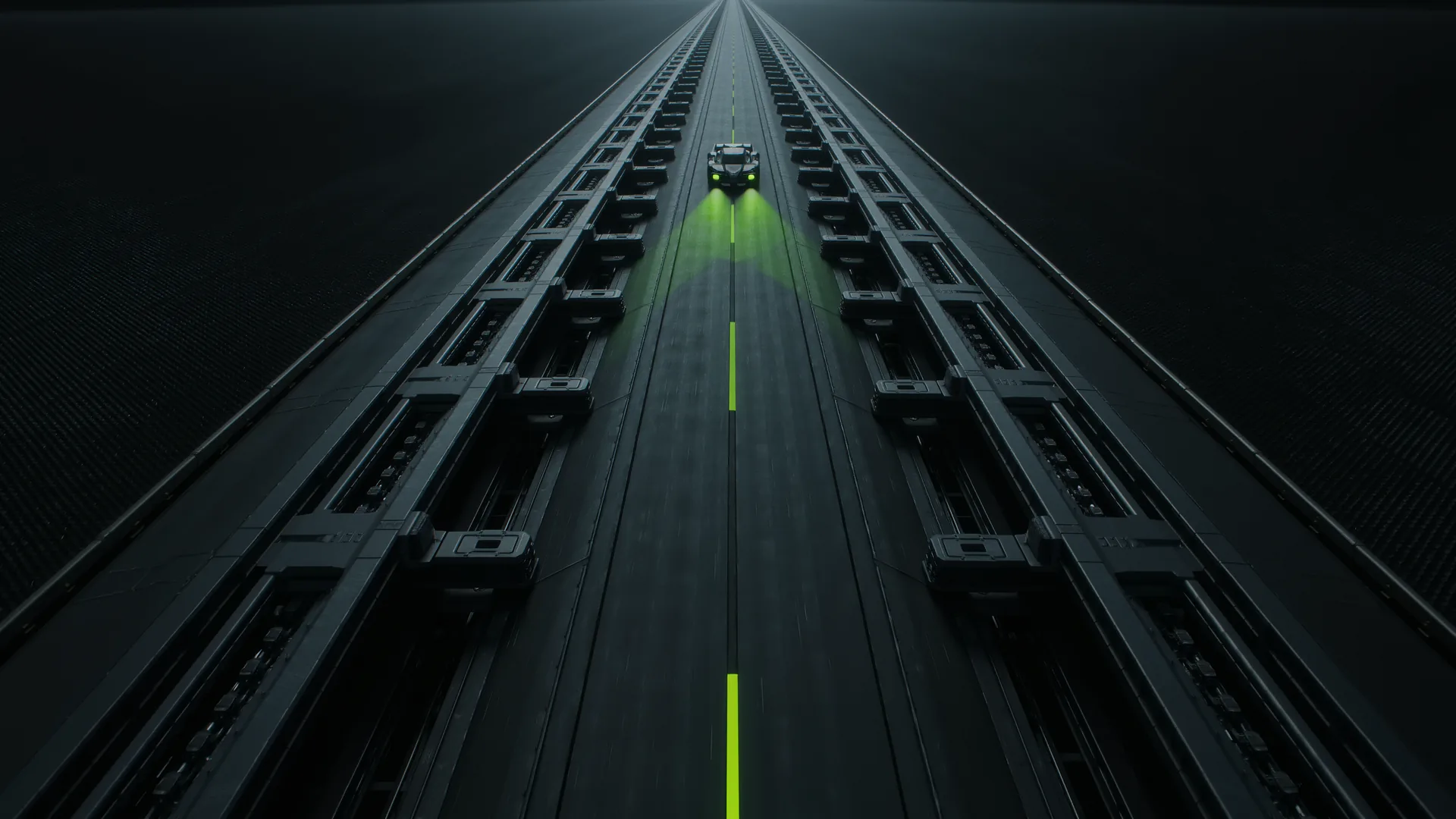 Aerial view of a long straight proving ground road disappearing toward the horizon